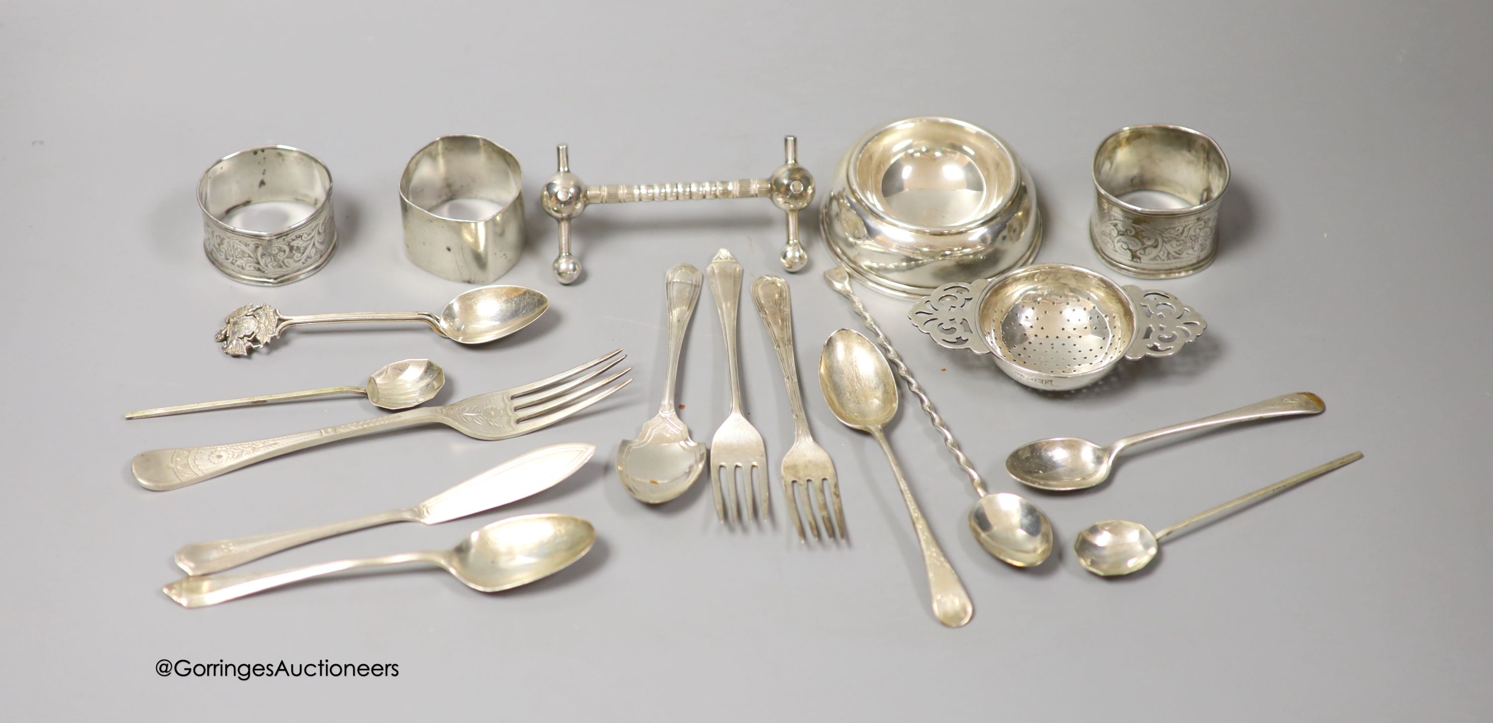 Minor small silver including teaspoons, butter knife, napkin rings etc. and four silver plated items